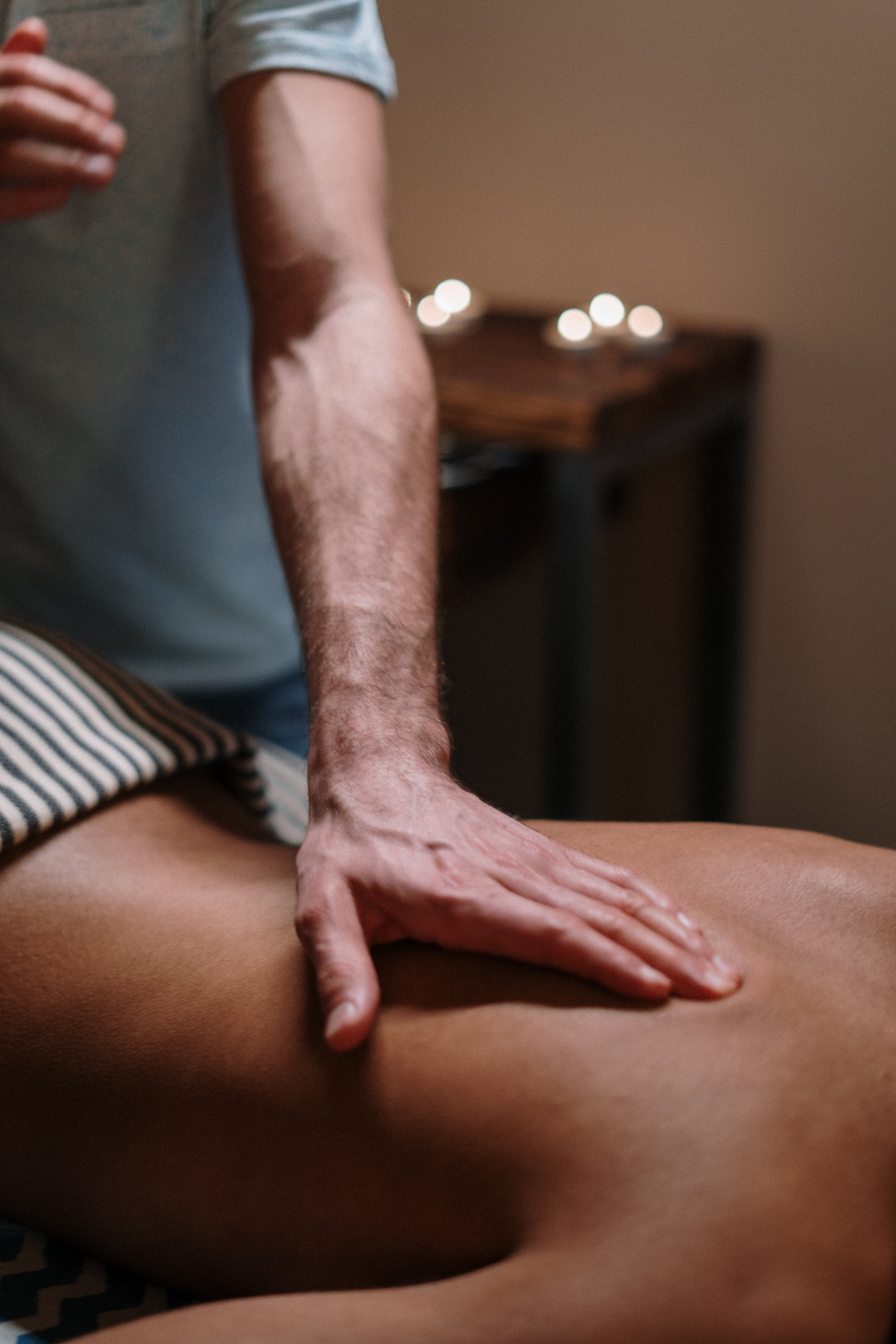 Topless Woman Having a Body Massage